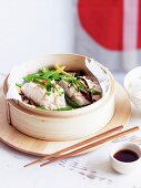 Steamed fish with mushroom and soy sauce (Asia)
