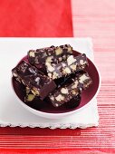 Chocolate biscuit slices with macadamia nuts