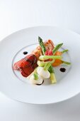 Lobster tail with spring vegetables and champagne sauce