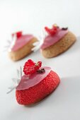 Vanilla choux pastry with raspberry icing