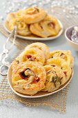 Puff pastry spirals with ham and cheese for Christmas