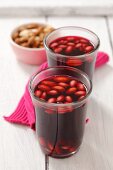 Mulled wine with almonds and blackcurrant juice