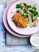 Vegetable cakes with a pear salad