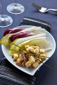 Chicory salad with walnuts, mountain cheese and a lemon and sour cream dressing