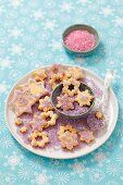 Star-shaped biscuits with purple sugar
