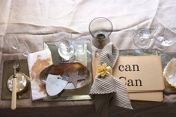Festive place setting with seashell and mother-of-pearl accessories
