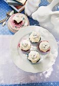 Chocolate cakes with decorated with butter cream and sugar eggs