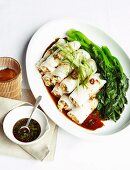 Steamed rice noodle rolls filled with prawns