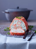 Fish and parsley terrine wrapped in smoked salmon
