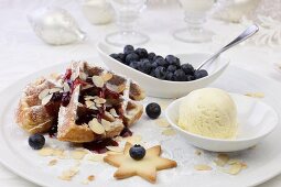 Waffles with blueberries and vanilla ice cream