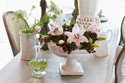 Summery flower bouquet with lilies and blackberries