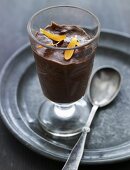 Chocolate pudding decorated with flower petals