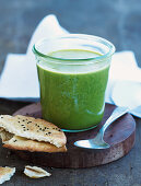 Herby soup with unleavened sesame seed bread