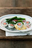 Sole roulade filled with salmon with potato and sweetcorn puree and green asparagus