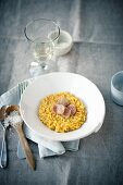 Saffron risotto and beef marrow slices