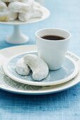 Kourabiedes (Greek Christmas biscuits) and a cup of coffee