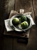 Savoy cabbage balls with cream and nutmeg