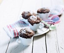 Chocolate cupcakes with icing sugar