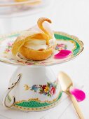 A choux pastry swan (close-up)