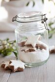 Sugar and cinnamon stars in a flip top jar