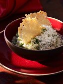 Risotto with herbs and parmesan shavings