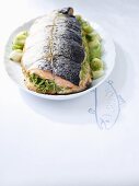 Salmon with a herb filling and leek