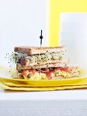 A beansprout, ham and scrambled egg club sandwich