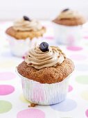 Coffee-nut cupcake with mocha beans