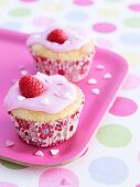 Almond cupcakes with raspberries