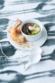 Miso soup with prawns in tempura batter