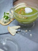 Broccoli soup and crackers with blue cheese
