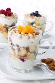 Quark cream with fruit salad and nuts
