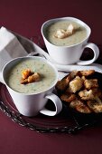 Cream of potato and spinach soup with croutons