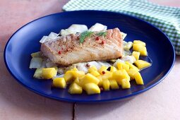 Cod on a leek medley with mango salsa