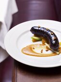 Black pudding with potatoes and apple sauce