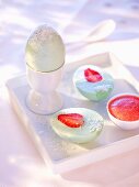Coconut eggs with strawberry yolks