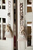 Lavender bags hanging from keys in cupboard locks