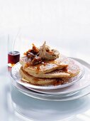 Cinnamon pancakes with maple syrup and candied walnuts