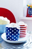 Cocoa with marashmallows in stars and stripes mugs
