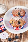 Blueberry muffins next to Union Jacks