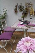 Garden table with red wine