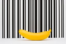 Food concept, banana in front of bar code