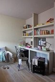 Corner of teenager's bedroom - classic metal chair at desk and minimalist wall-mounted shelving