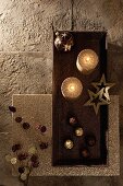 Chocolates, gold candles and Christmas decorations