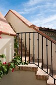 Brick staircase with wrought iron railing