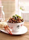 Spicy stir-fried chicken with spring onions
