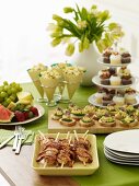 Appetizer Table with Tiered Cupcake Stand