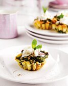 Spinach and feta tartlets with yoghurt topping