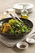 Fragrant olive and rosemary polenta served with tomato, basil and sprout salad