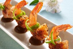 Fried prawn kebabs with limes and a tamarind sauce